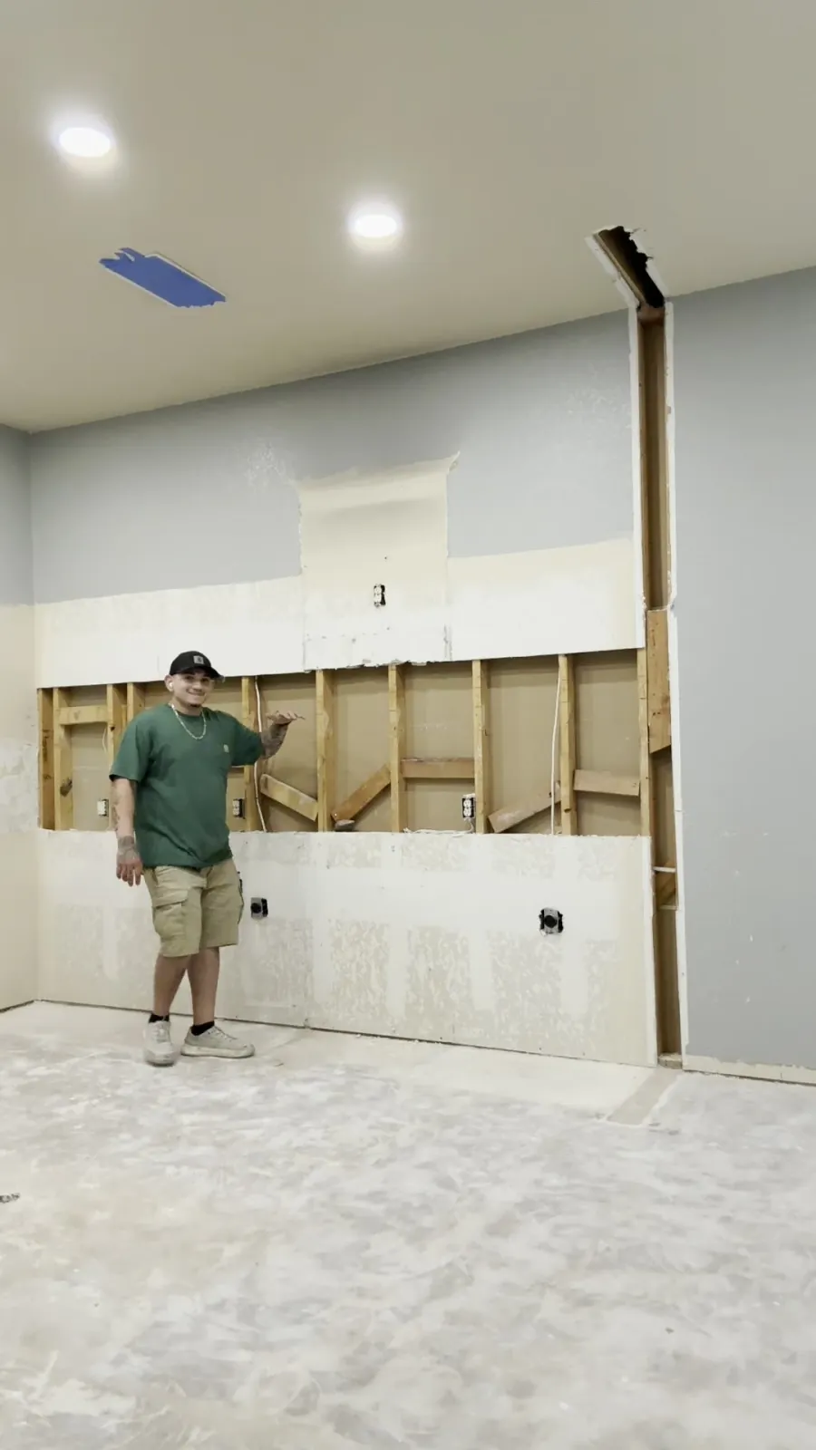 An opened San Antonio kitchen wall showing timber blocking between studs where upper cabinets will mount