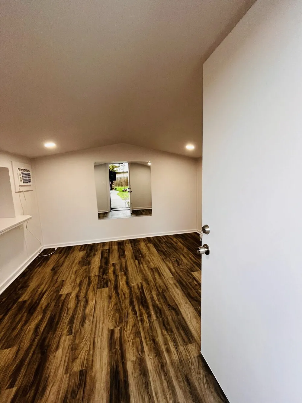 Studio corner with the mirror alcove and finished flooring